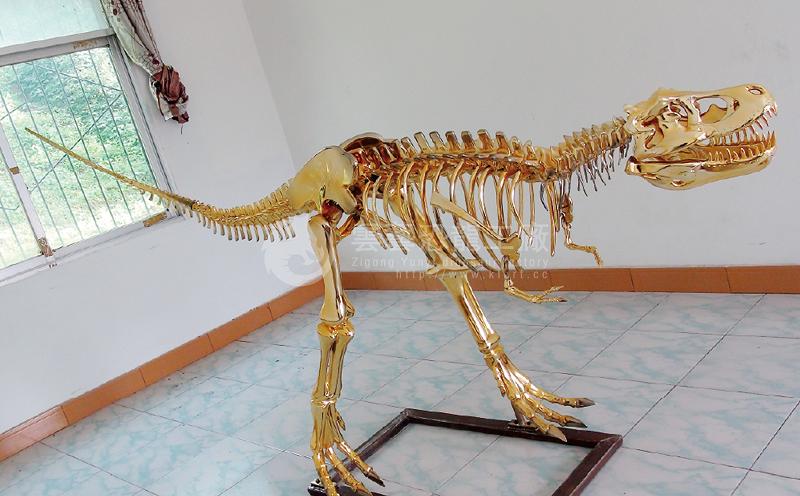 Simulated Tyrannosaurus Rex gold skeleton